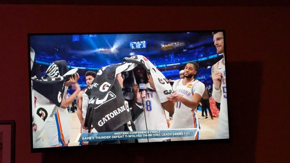 Nick Gallow being covered with towels, by OKC Thunder.