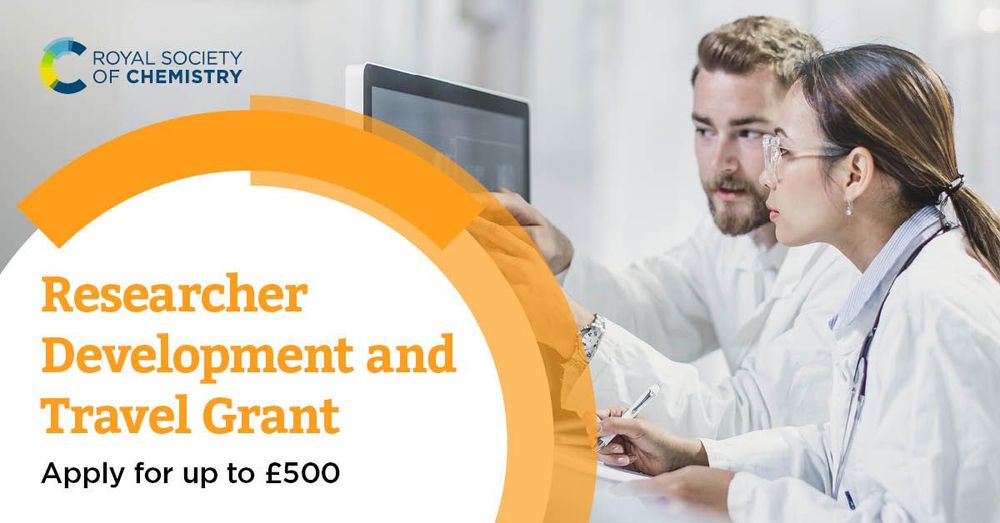 Two researchers, one using a tablet and the other taking notes, are discussing their work in a lab. Text overlay advertises the Royal Society of Chemistry's Researcher Development and Travel Grant, offering up to £500.