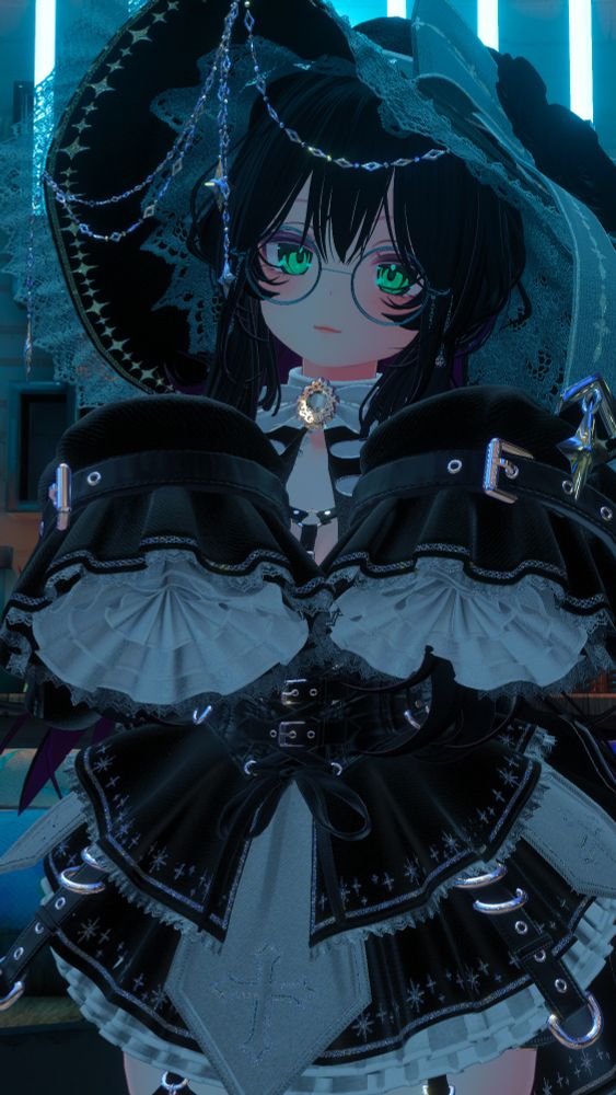 Girl dressed in a witch outfit, posing cutely for the camera