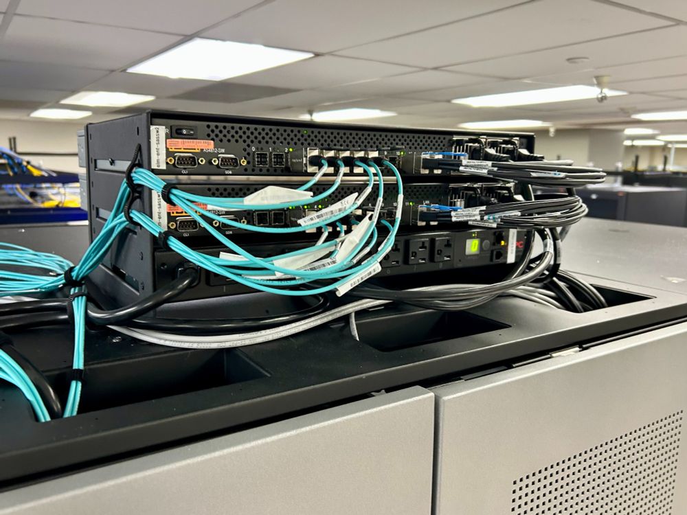 Dual Astek SAS switches on top of TFinity tape library.