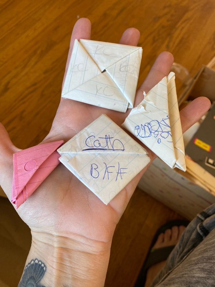 A handful of folded up notes we used to pass in class. Texting in the 90’s