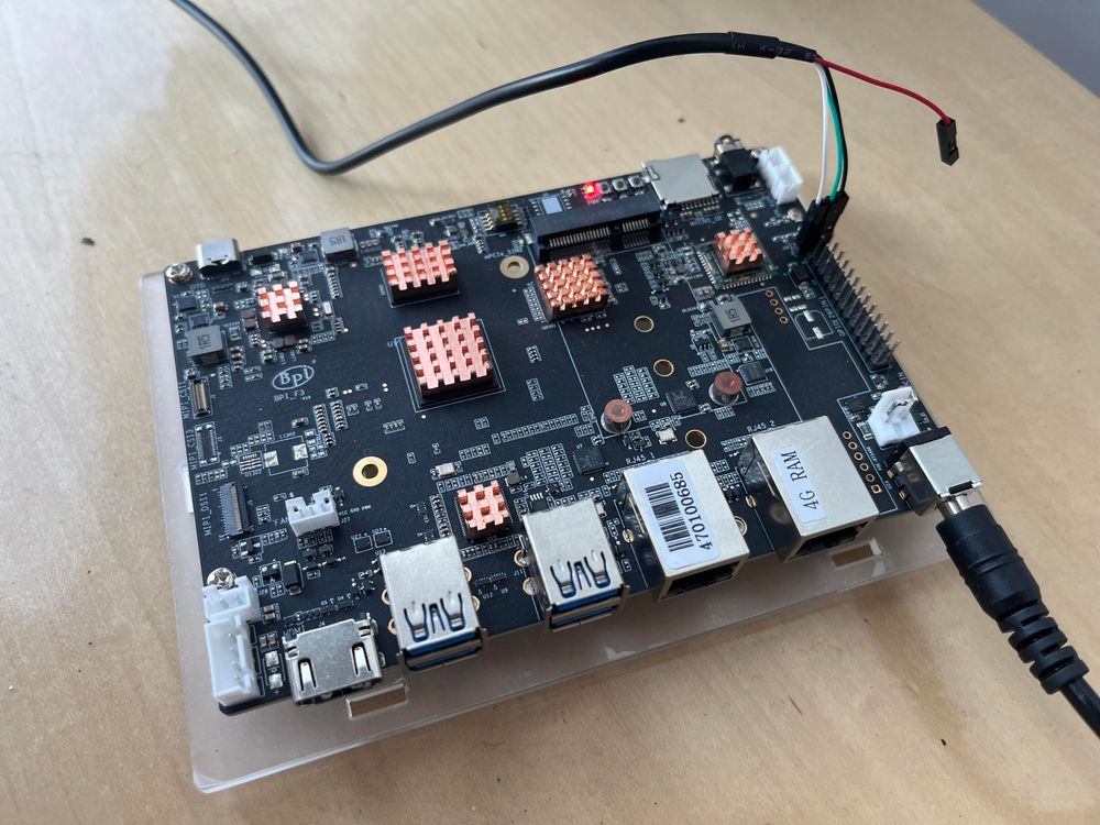Just a boring-looking single-board computer with power and UART attached.