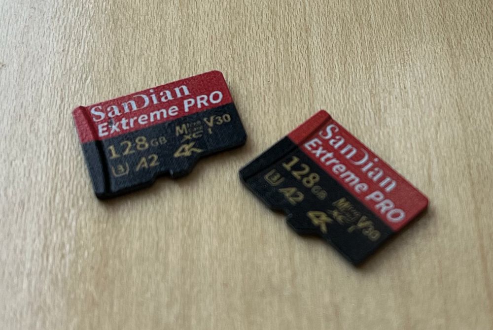 Two 128 GB MicroSD cards labeled "SanDian Extreme Pro," emitting extreme knockoff vibes.