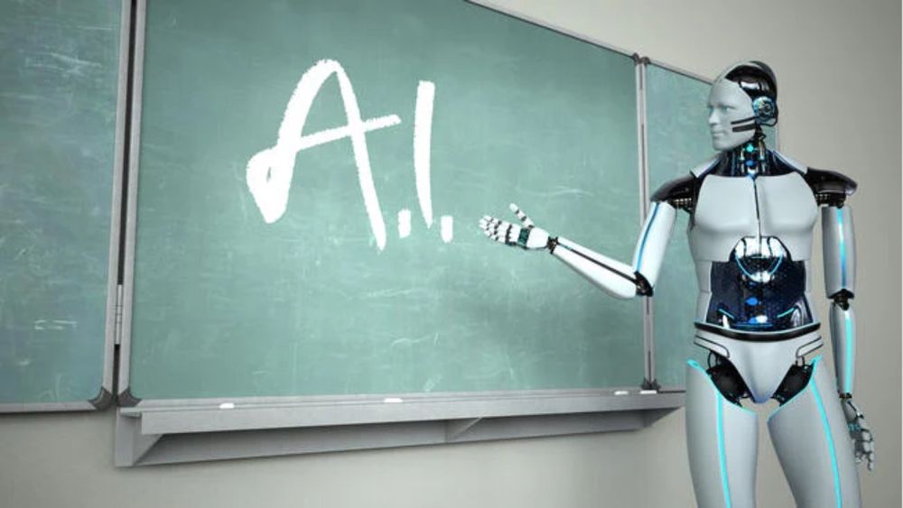 A robot teaching a class. It's pointing at a chalkboard with the acronym A.I.