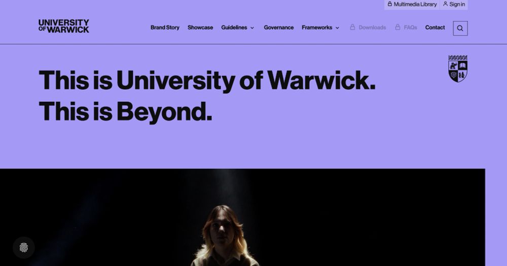 The 'Explore our Brand' page from the University of Warwick. Black text on a purple background. It says 'This is University of Warwick. This is Beyond'.