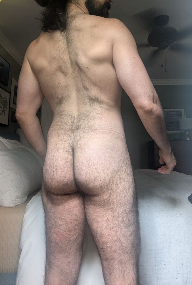A picture of me naked from behind. You can see my hairy back and butt.