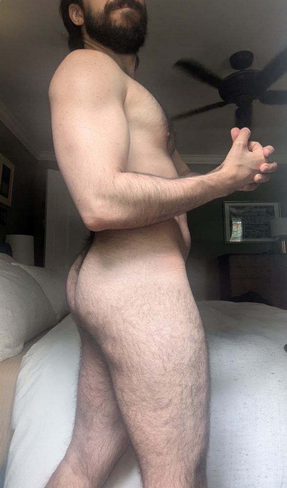 A picture of me naked, side view, so you can see my butt in profile and my chest. 