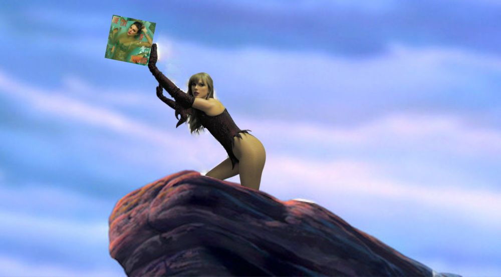 Edit by me - scene from the lion king where they are standing on the top of the cliff and holding up baby simba, but instead it’s taylor swift wearing the black/red bodysuit and gloves holding up her new album the life of a showgirl  