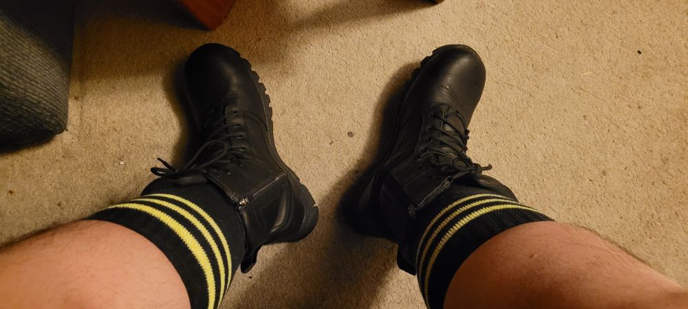 My size 13 black leather boots and black and yellow CB13 socks in place on my feet. 