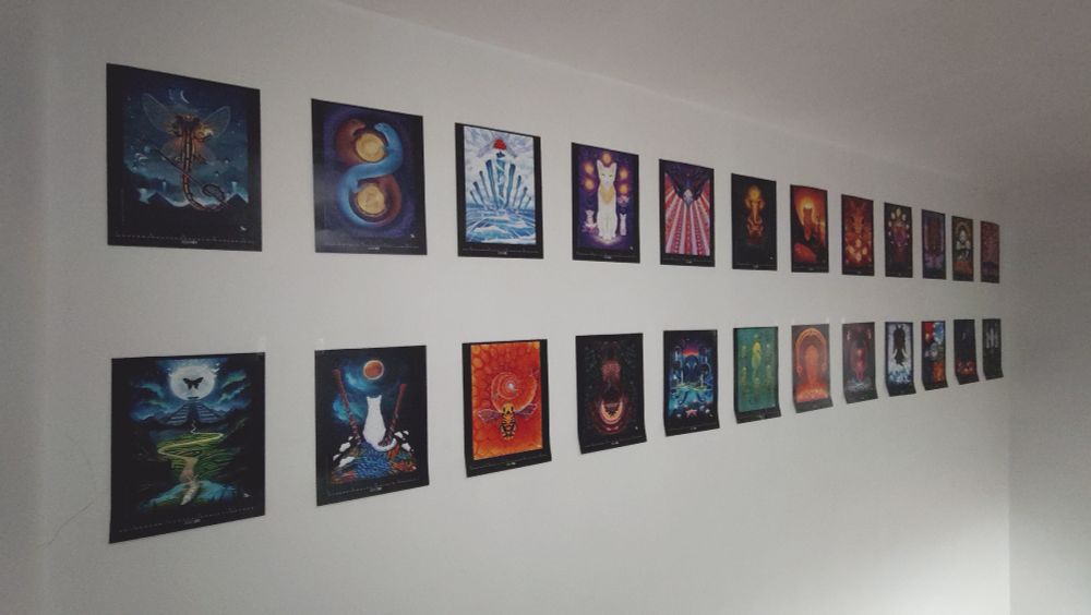 A white wall upgraded with 24 posters taken off past calendars from German artist Silvia Ritter.