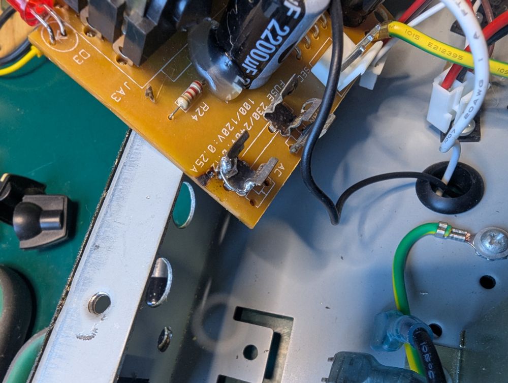 Soldering a fuse holder together. In a loose sense of all those words.