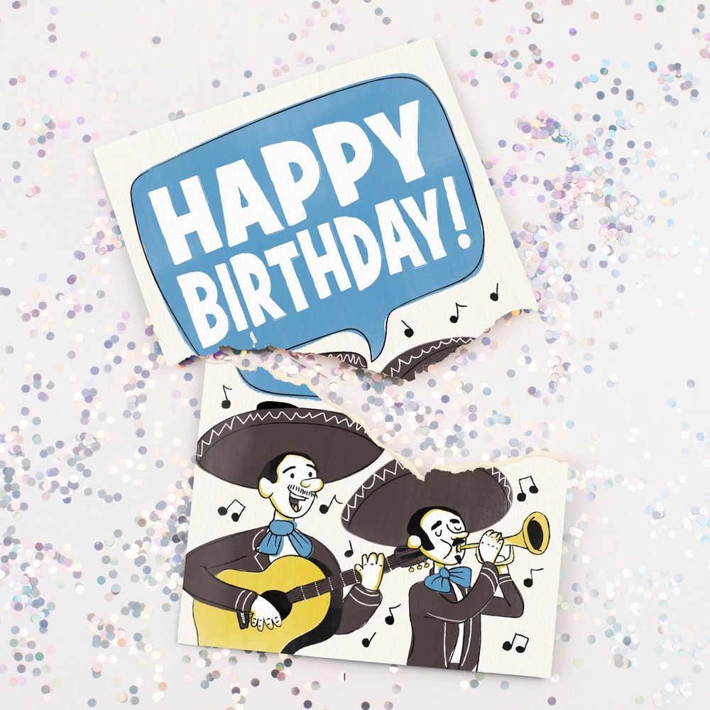A card that says Happy birthday with a Mariachi band on the front. The card has been torn in half, with glitter everywhere.
