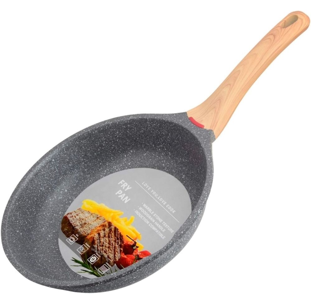 A grey frying pan with a wooden handle.