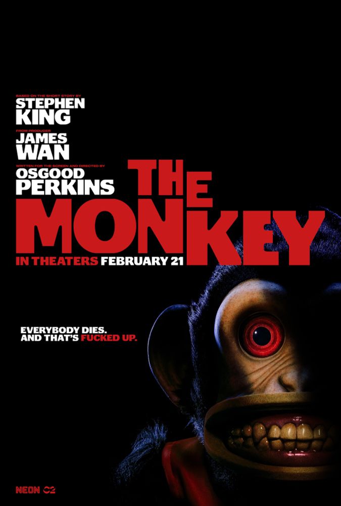 The movie theatre poster for the movie “The Monkey” in theatres February 21st. There is an evil monkey with glowing red eyes. 