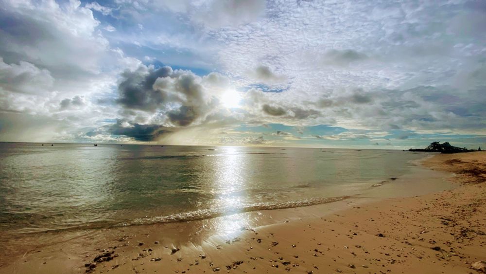 Sunset in Nauru over a golden beach in the foreground