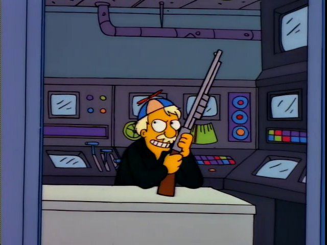 Simpsons still, footage of a power plant employee clutching a shotgun, a festive beanie on their head, and grinning.