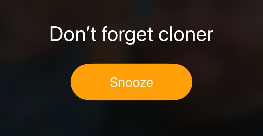 Screenshot from phone alarm Lock Screen stating “Don’t forget Cloner” with snooze button