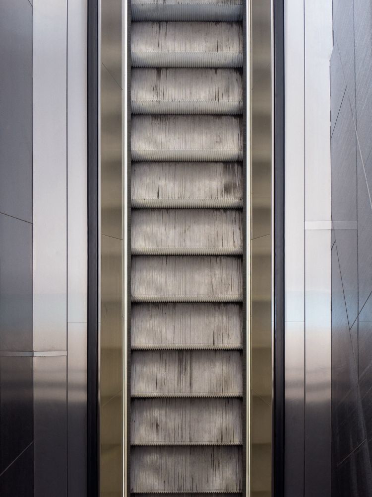 Escalator at the Albertina museum in Vienna. Photographed from above.