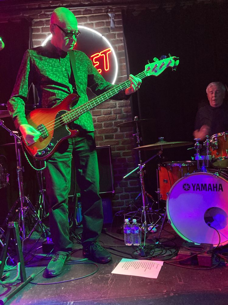 Steve Hanley plays bass guitar with House of All.