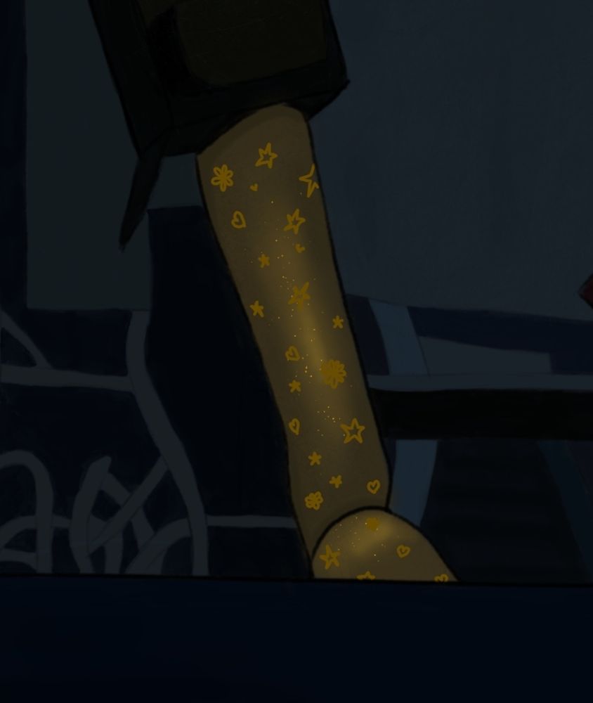 A close up of the leg with stars, hearts, and flowers