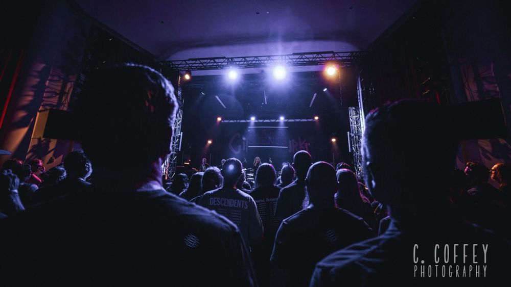 Legendary punk band, The Adolescents viewed from the crowd inside OKC’s Tower Theatre. 