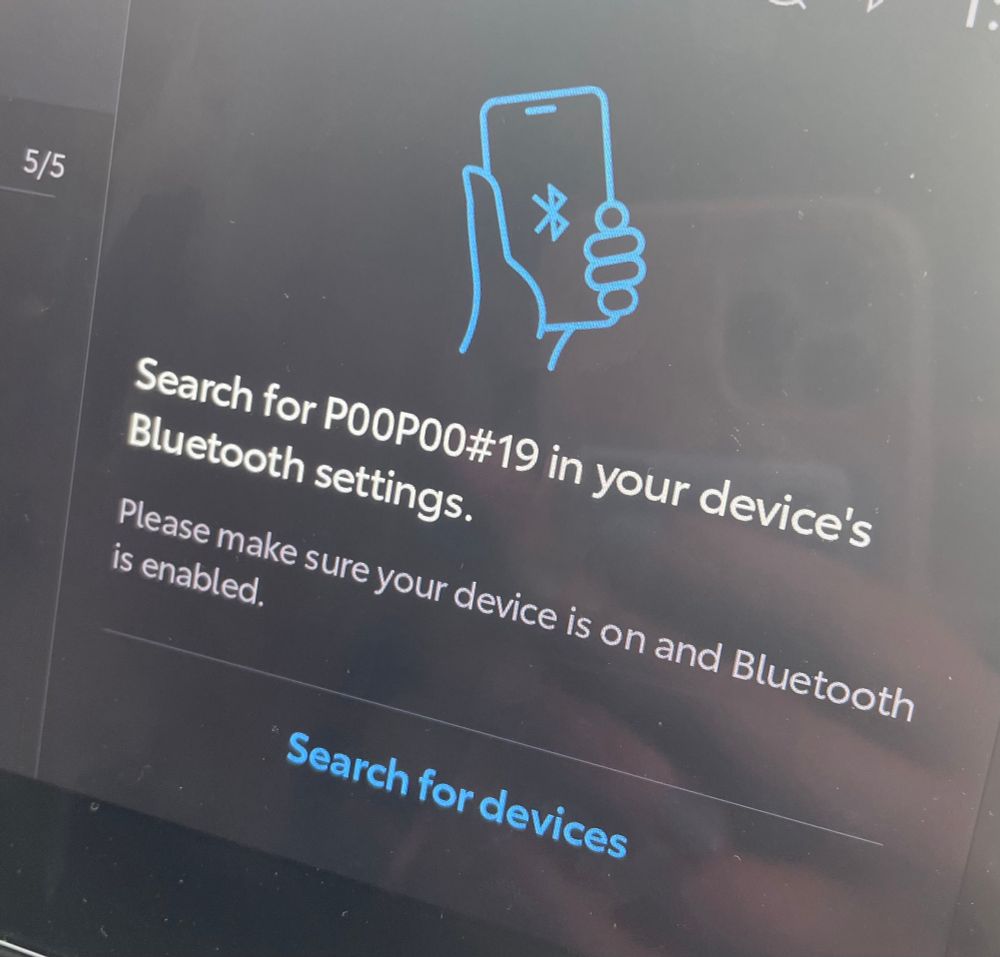 A carshare's touchscreen reads: "Search for P0OP00#19 in your device's Bluetooth settings."
