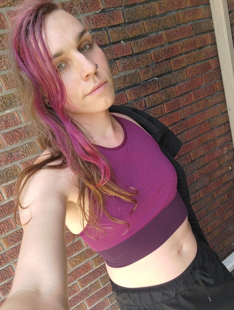 Vvn in a sporty purple top. it kinda matches their hair