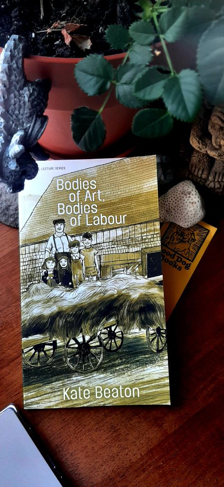 Cover of "Bodies of Art, Bodies of Labour" by Kate Beaton. 

A stylized drawing of a man and four children standing on the back of a horae-drawn cart loaded with fresh cut hay.
