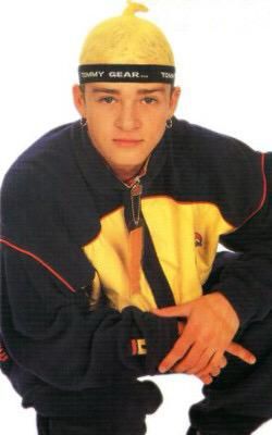 Justin Timberlake dressed like a Tommy Hilfiger mannequin from Dillards, complete with yellow stocking cap looking like a damn snork. Allstar Seaworthy head ass
