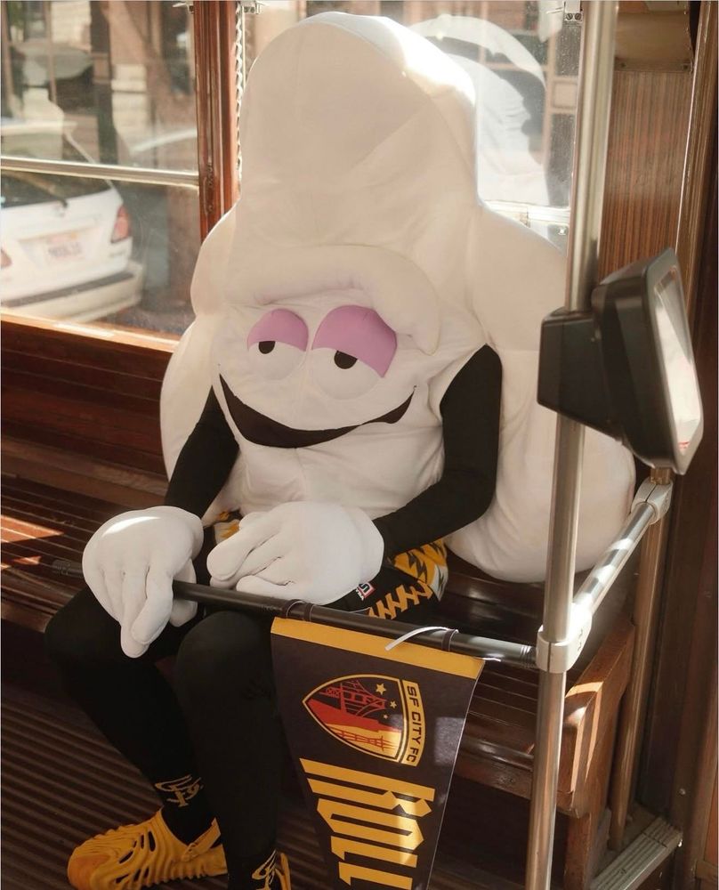 SF City soccer club’s fog mascot on a cable car - photo posted online and unknown attribution 