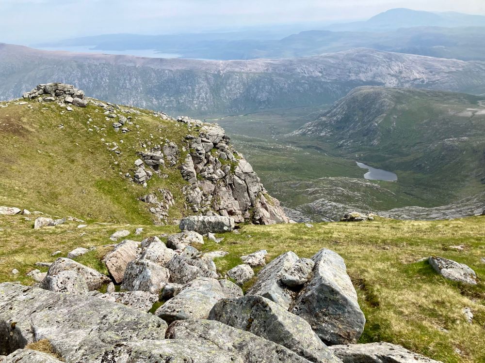View NE from summit ridge of Foinaven. Ben Hope in the distance.