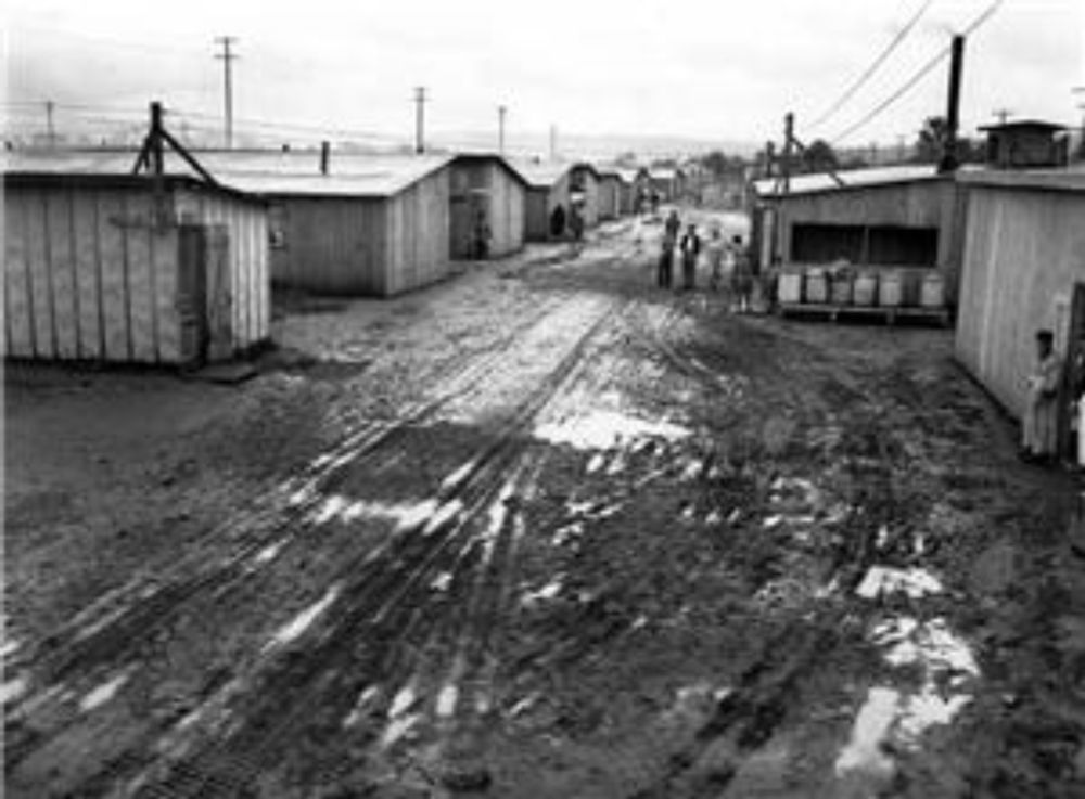 The Puyallup Assembly Center, better known by the euphemism Camp Harmony, a name coined by an Army public-relations officer during construction in 1942, was situated at the Western Washington fairgro