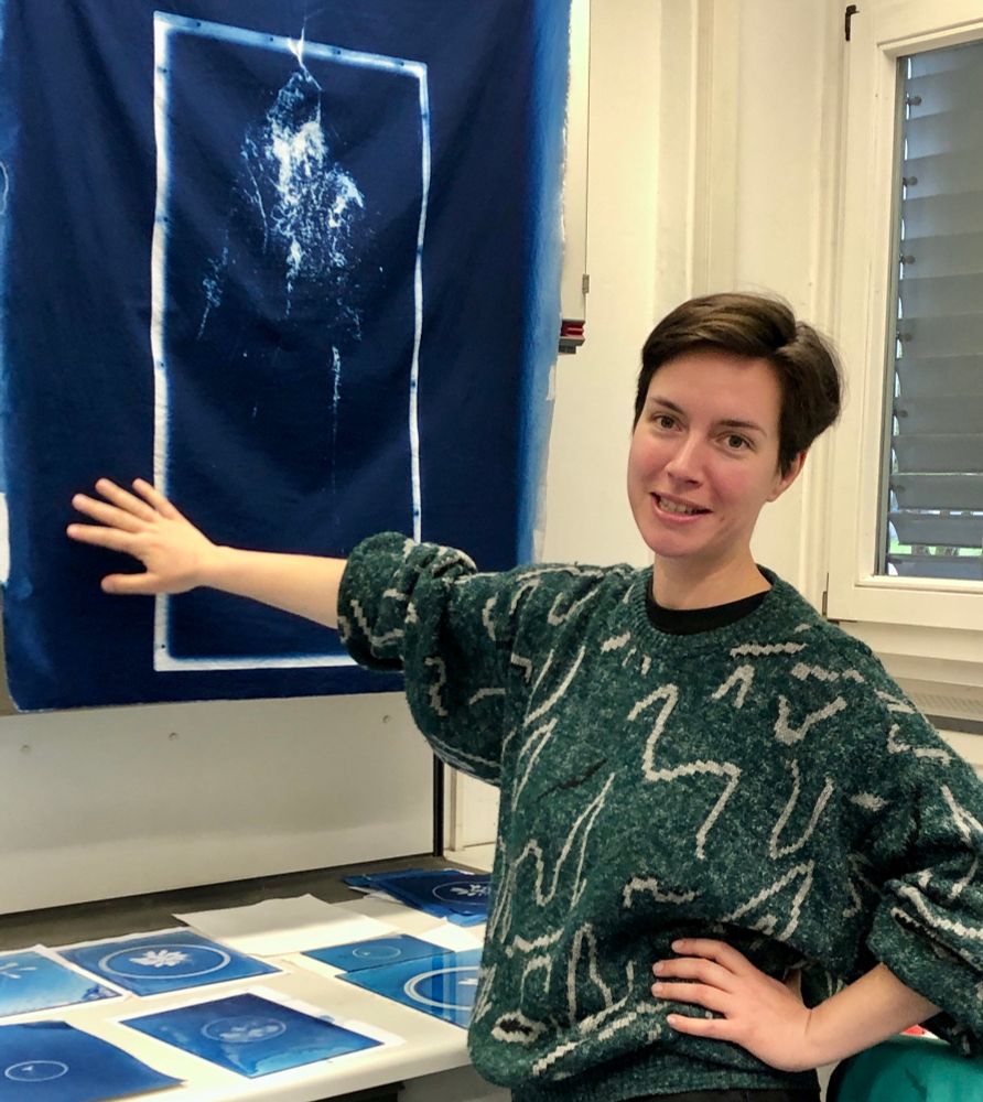 Simone Kessler explaining her cyanotype images from roots of Arabidopsis and poplar.