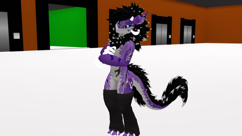 A purple and white wickerbeast with silver and black markings, and pretty blue eyes, wearing baggy leg warmers stands on a white floor in an orange room with a ton of elevators. You can also see the entrance to a green room in the background too.