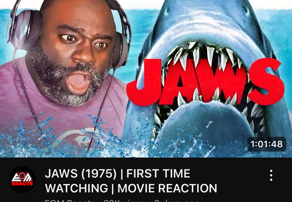 screenshot of man reacting to jaws