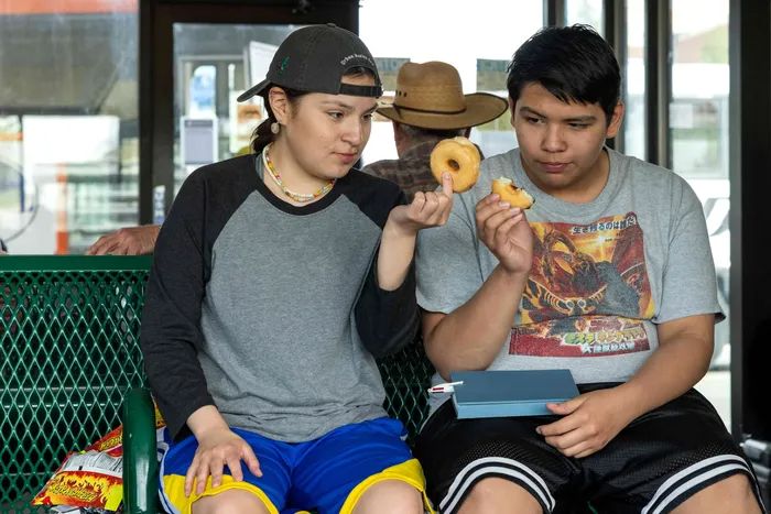 Willy Jack and Cheese eating doughnuts from an episode of Reservation Dogs