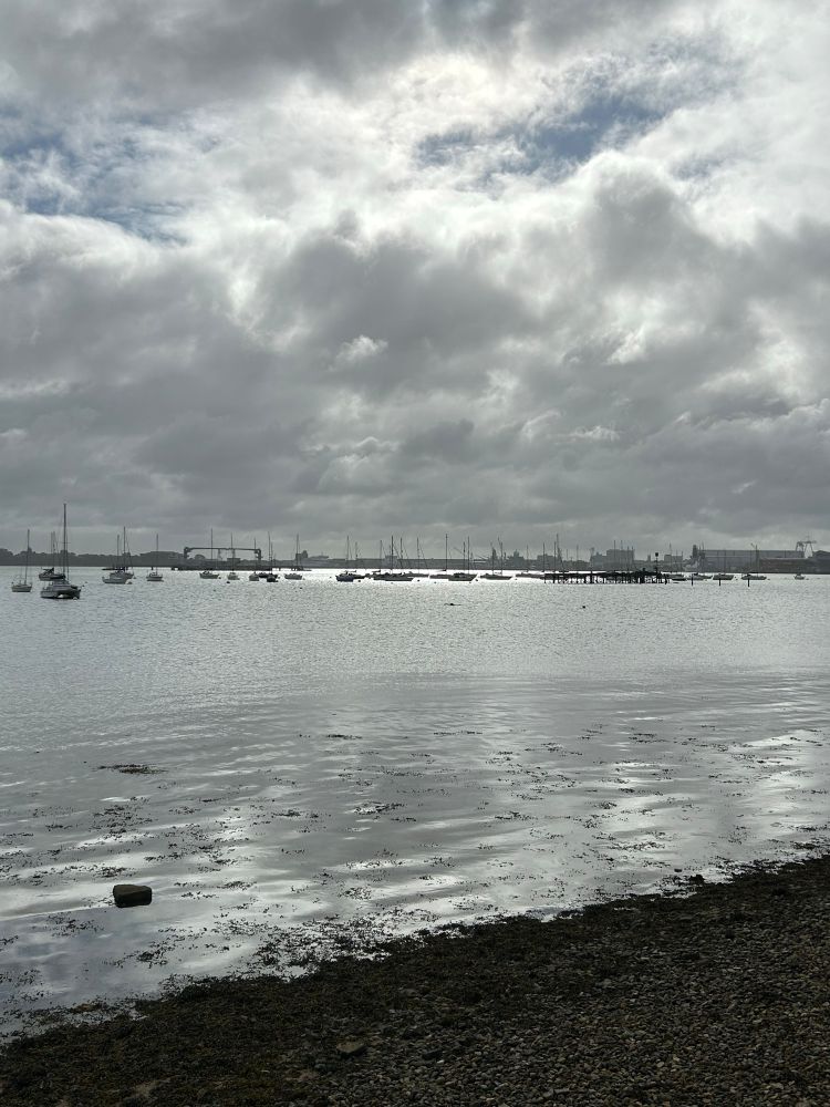 silvery light across  yachts in Portsmouth Harbour