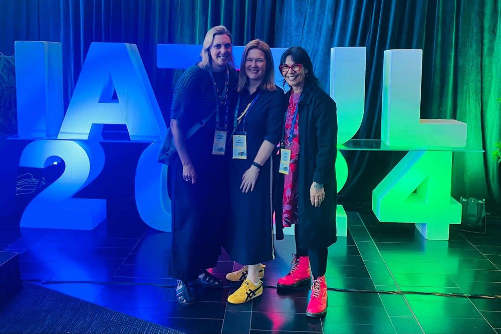 Here are the three 44th IATUL Conference Co-Chairs standing in front of a big IATUL2024: Michelle from @waikatouniversity, Sue @universityofauckland and me from @aut_library @autuni #instatags