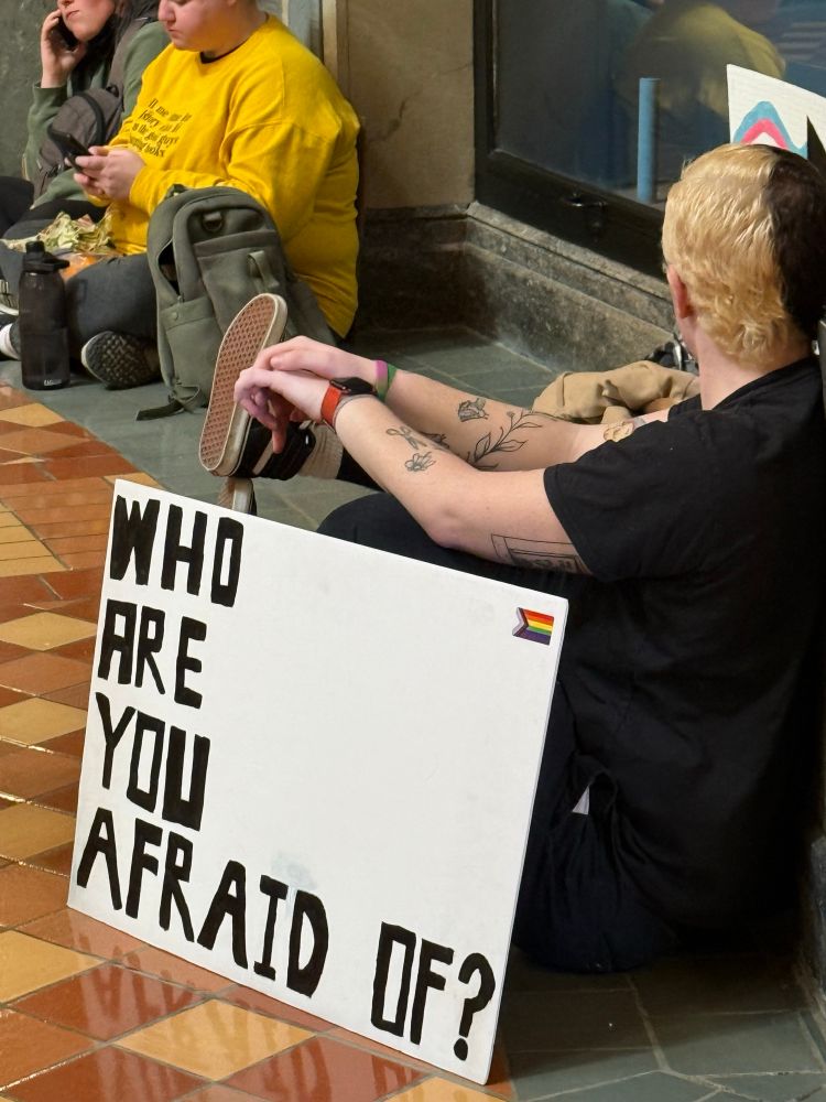 Who are you afraid of? Poster from the Iowa capitol protest taking away civil rights.