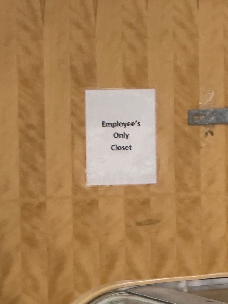 Sign on a door that says “Employee’s Only Closet” [sic.]