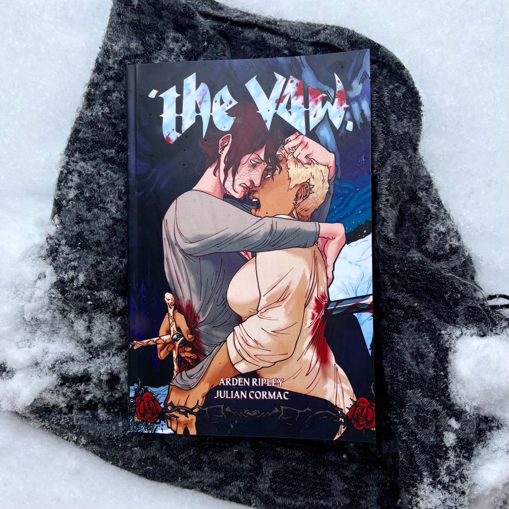 A photo of the graphic novel The Vow set against a snowy backdrop. 
