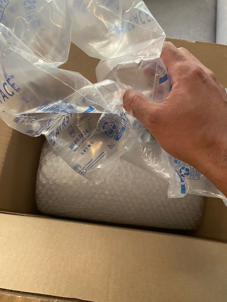 An Amazon box of bubble wrap wrapped in bubble wrap. 
