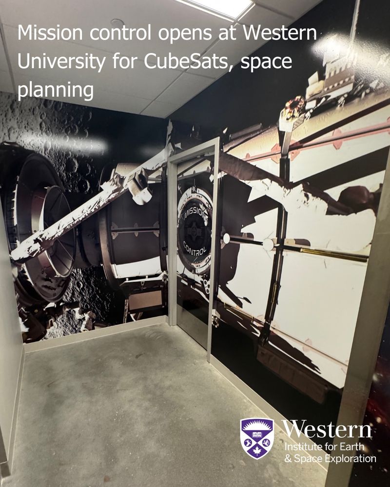 image of space and space craft decorate the hallway outside of the mission control facility