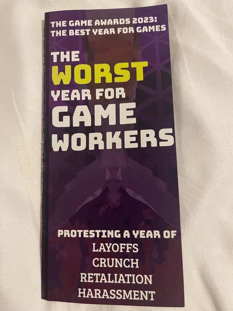Pamphlet handed out at The Game Awards reminding people of the devastating job losses this year.