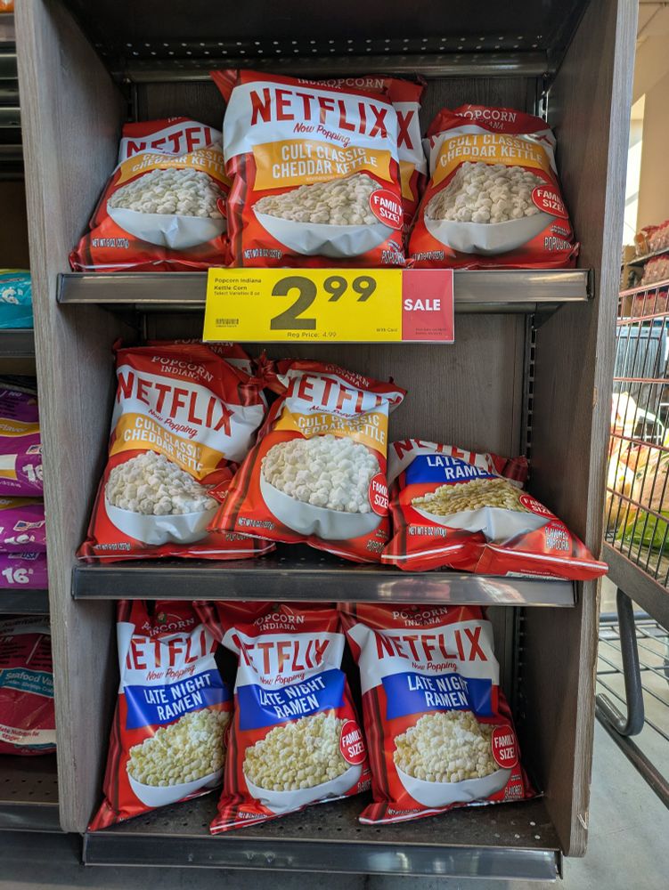 Shelves of Netflix popcorn at Metro Market