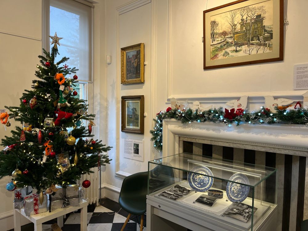 Image of a Christmas tr and exhibits at Woodend Museum in Scarborough