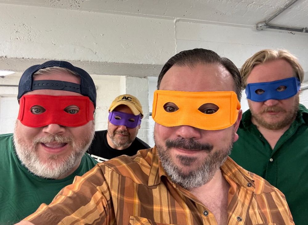 This is a photo of the four WHM guys wearing Ninja Turtle bandanas before the live Animation Damnation tonight. 