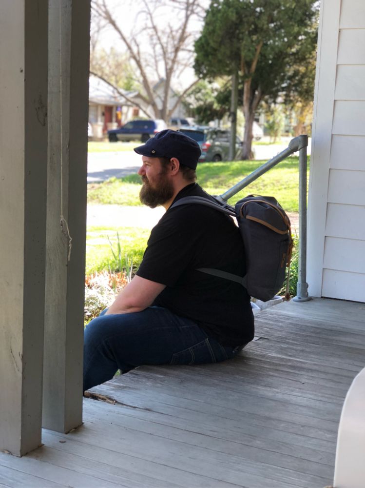 Chris waiting for a car in Austin