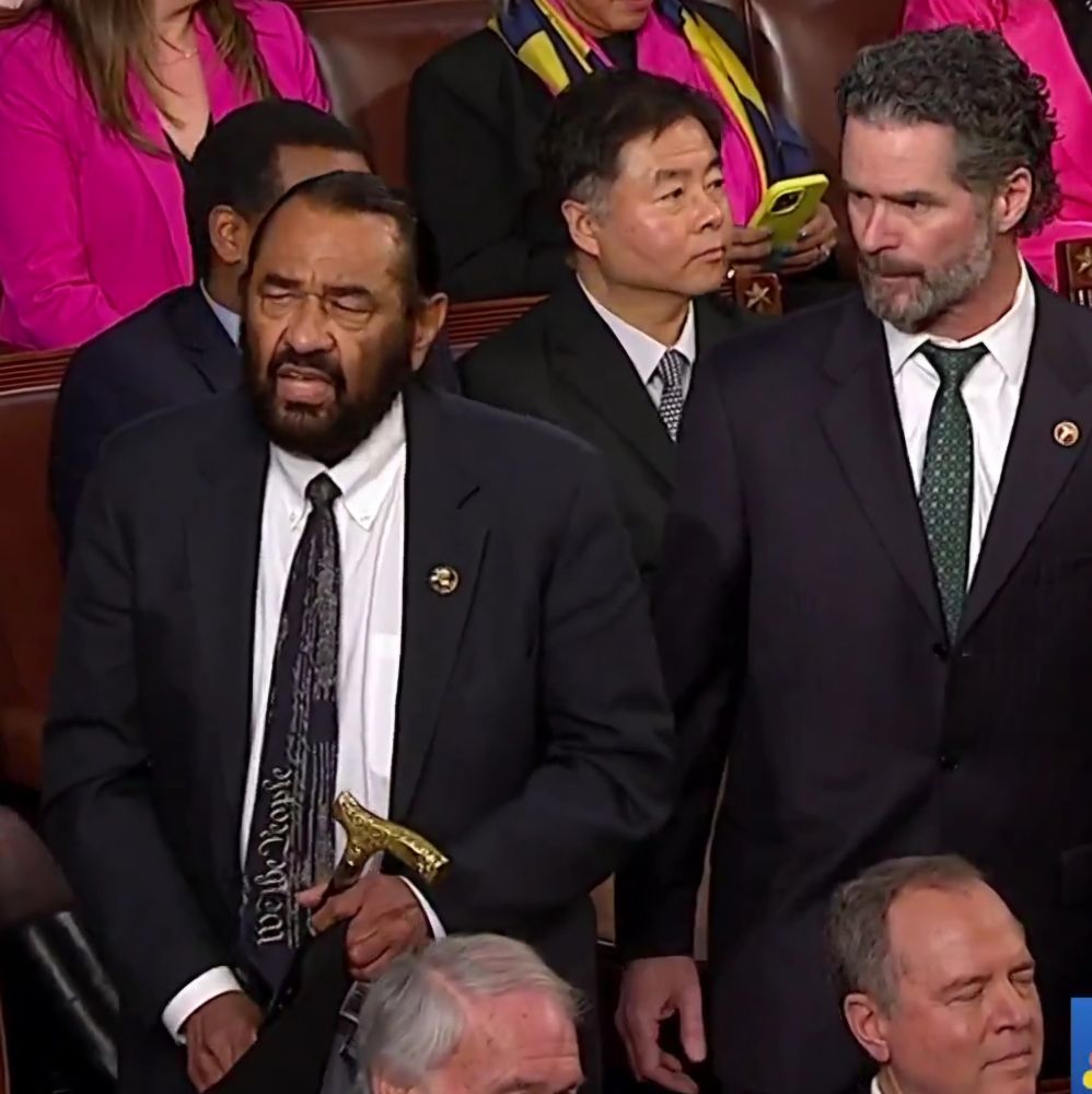 Congressman Al Green is removed from the chamber by a MAGA goon.