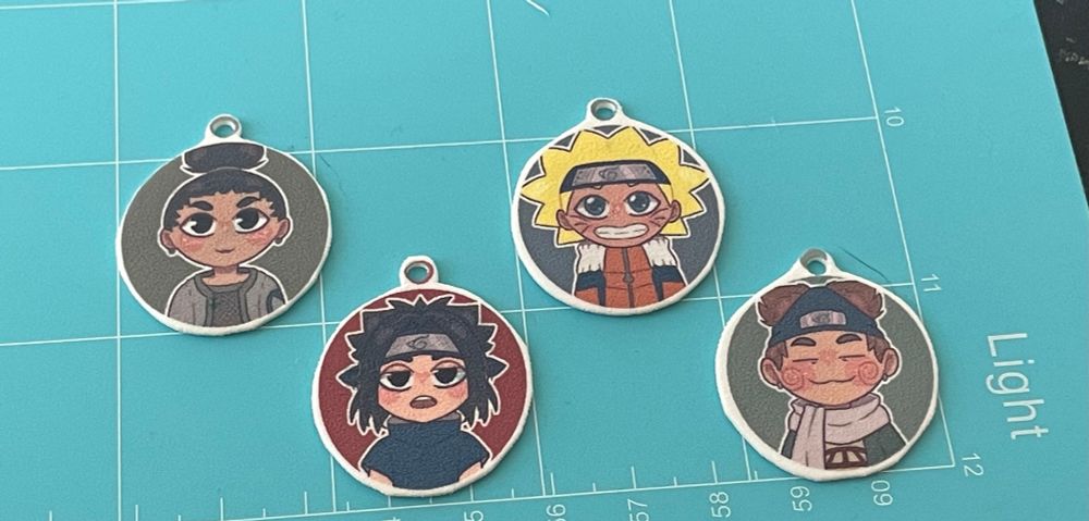 Shrink charms of Shikamaru Nara, Sasuke Uchiha, Naruto Uzumaki, and Choji Akimichi 